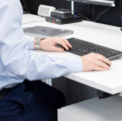 man using mouse and keyboard