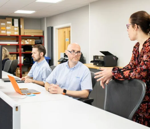 team meeting at desk